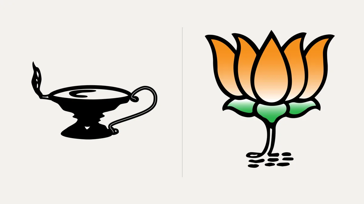 An oil lamp symbol on the left and the BJP lotus symbol on the right