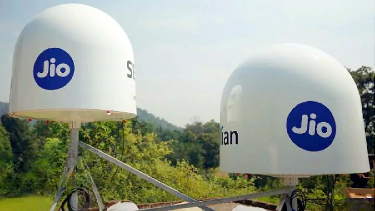 Two JioSpaceFiber satellite terminals carrying Jio and SES branding